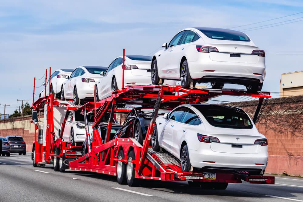 Car hauler transporting multiple vehicles